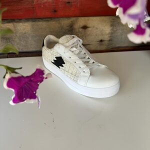 witte sneaker bliksem